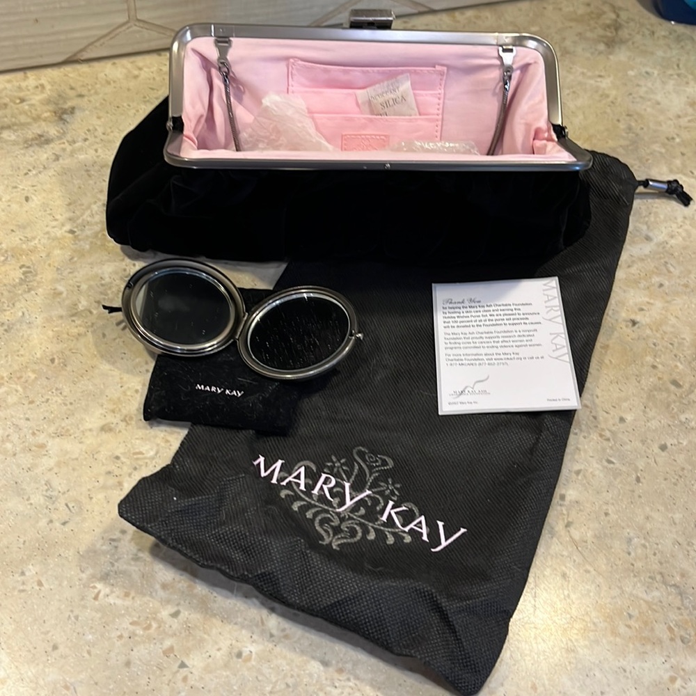 Mary Kay black velvet purse with mirror compact and dust cover.